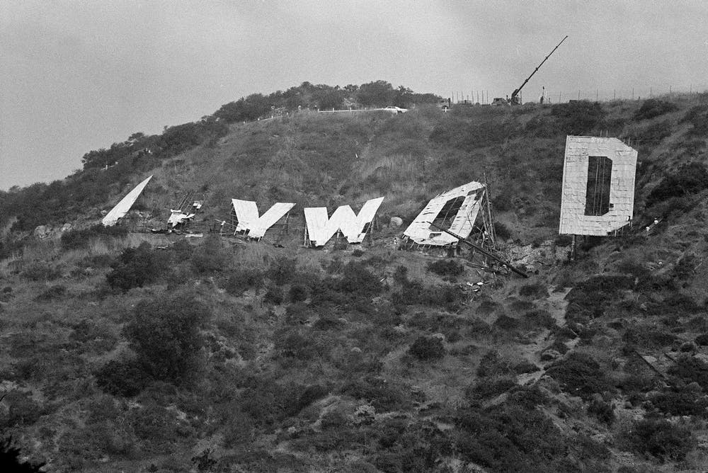 The sign in 1978. Workers prepare to lower the last letter of the old Hollywood sign that had stood at the site since the 1920s.  Wally Fong/AP Photo