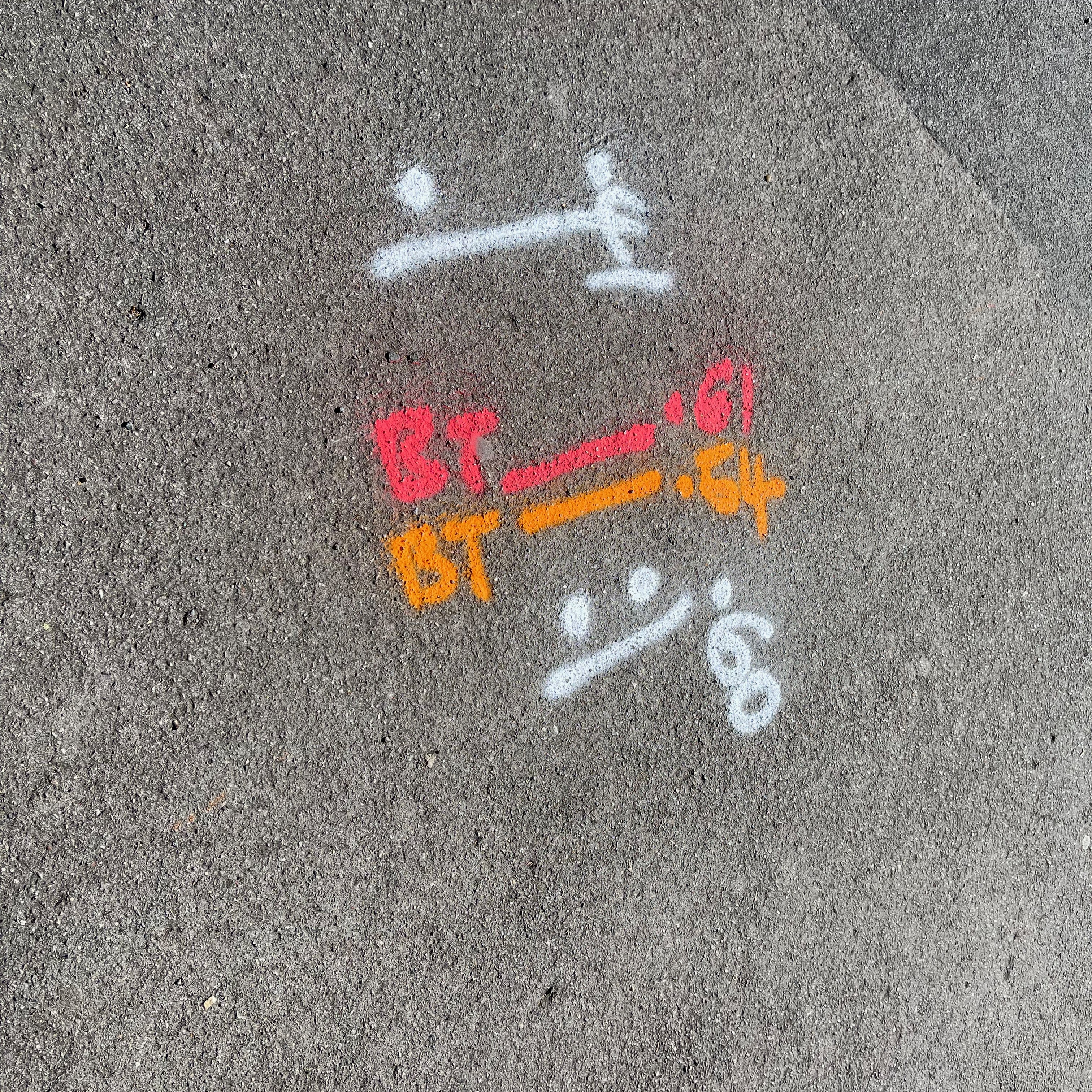 Services under the road are indicated with colour and symbols